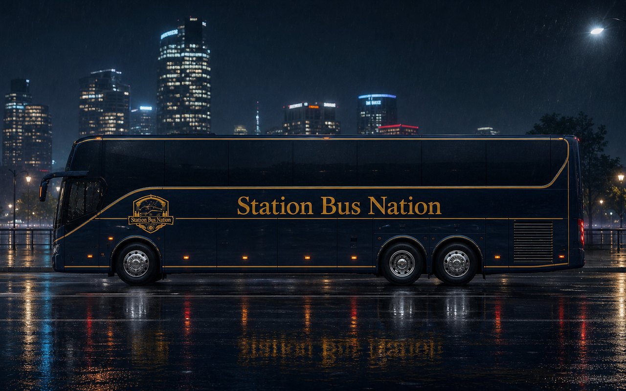 Station Bus Nation coach on a rainy city street at night